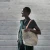 mifuko-sisal-shopper-basket-Kiondo light grey open weave model in studio.webp